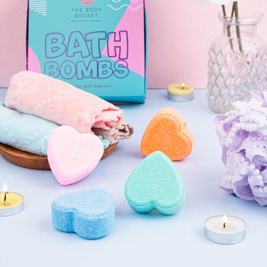 Pastel heart bath bombs with peachy blush, tangy orange, aqua and lemongrass (each 60 gm )