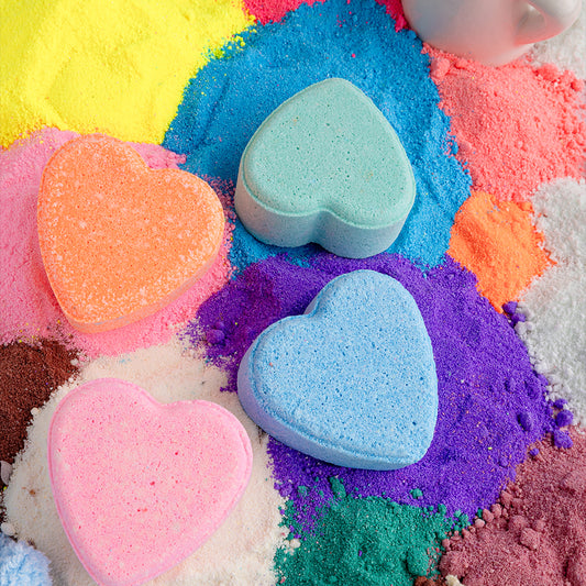 Pastel heart bath bombs with peachy blush, tangy orange, aqua and lemongrass (each 60 gm )